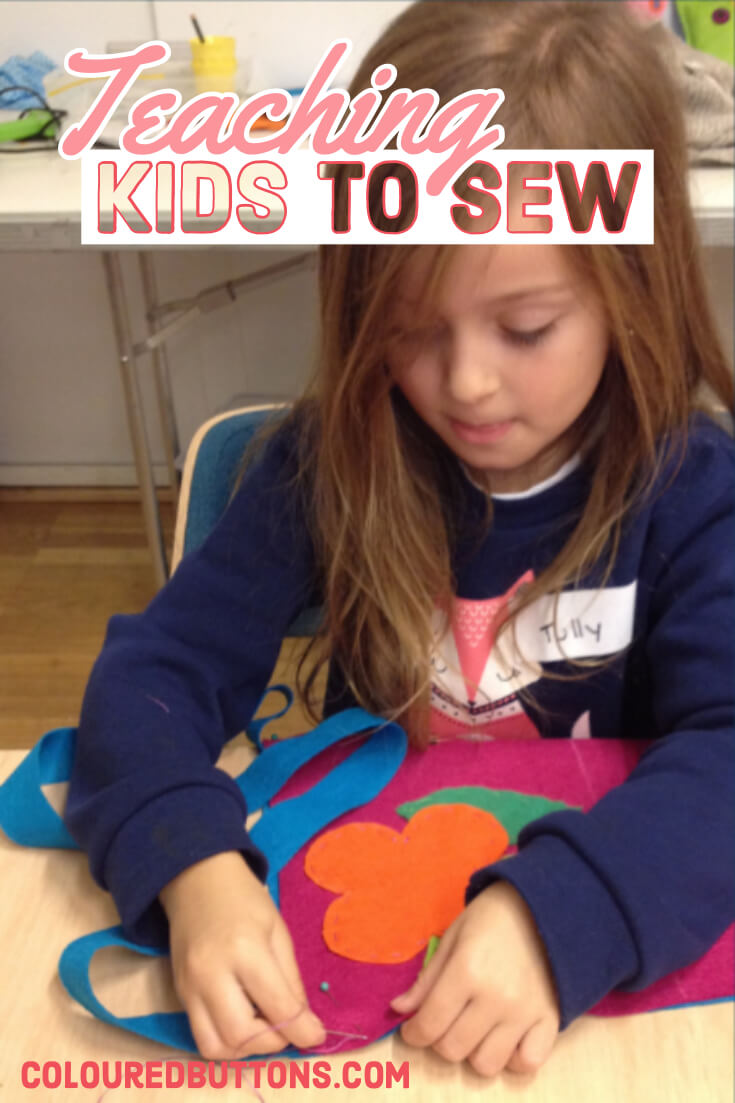 A girl learning how to sew