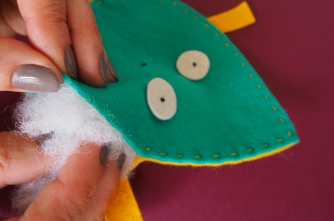 adding stuffing to a soft toy