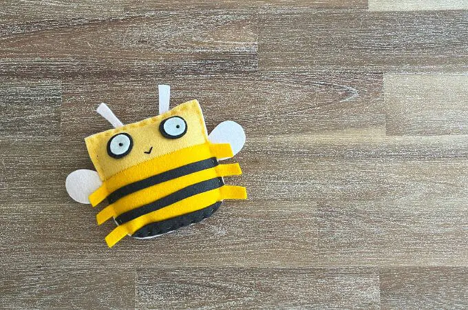 Sewing felt bee with kids